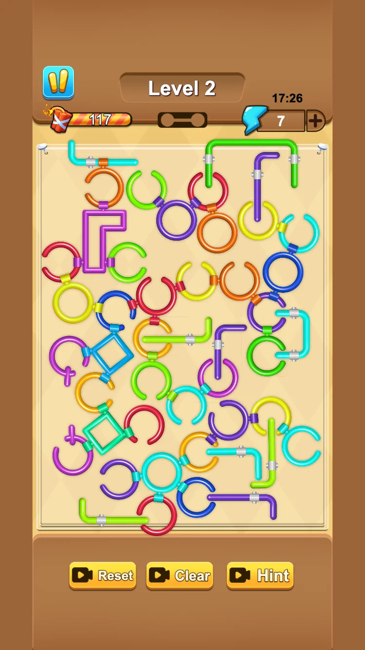 Level 2 board filled with colored rings, sliding rods, and square locks